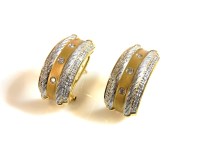 Lot 16 - A pair of 18ct gold earrings