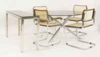 Lot 476 - A chrome 'X' frame dining table
