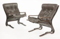 Lot 477 - A pair of laminate armchairs