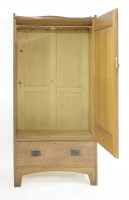 Lot 50 - An Arts and Crafts oak wardrobe