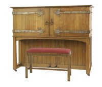 Lot 78 - An Arts and Crafts oak 'Manx' upright piano