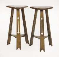 Lot 84 - A near pair of Arts and Crafts oak side tables