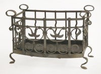 Lot 86 - An Arts and Crafts wrought iron log basket
