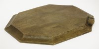 Lot 119 - An oak octagonal cheeseboard