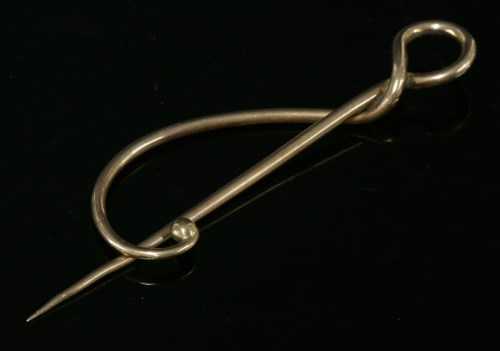 Lot 1 - A gold brooch or cloak clasp
