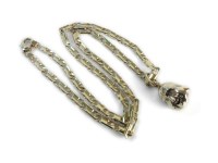 Lot 28 - An Italian gold Buddha on a gold figaro chain
