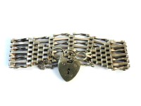 Lot 12 - A gold seven bar gate link bracelet
