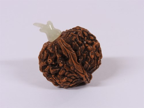 Lot 59 - A Chinese walnut snuff bottle
