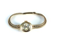 Lot 32 - A 9ct gold ladies Roamer mechanical bracelet watch