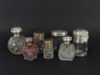 Lot 98 - Seven various silver topped glass scent bottles