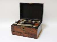 Lot 317 - A Victorian figured walnut toiletry box