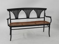 Lot 627 - A Thonet ebonised bentwood settee