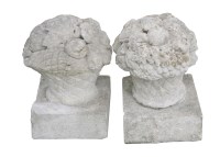 Lot 745 - A pair of reconstituted stone finials
