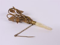 Lot 80 - A mid 19th century gilt metal and mother of pearl posy holder
