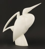 Lot 220 - A cream-glazed bird water jug