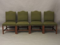 Lot 706 - A set of four Georgian style mahogany and green upholstered side chairs