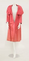 Lot 1181 - An Hardy Amies dark salmon opera coat