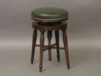 Lot 728 - A George III circular revolving stool