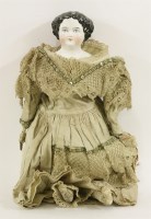 Lot 423 - A Late Victorian china shoulder-head doll with painted features