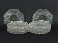 Lot 274 - A set of twelve Lalique leaf moulded side plates