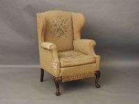 Lot 696 - A George I design walnut wing chair