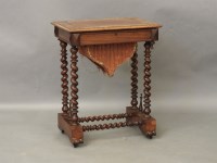 Lot 692 - A Victorian inlaid mahogany work table