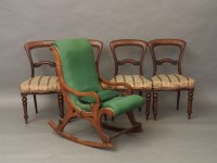 Lot 693 - A Victorian mahogany rocking chair