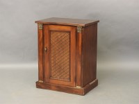 Lot 680 - A 19th century mahogany pier cabinet