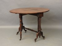 Lot 683 - A Victorian figured walnut Sutherland table