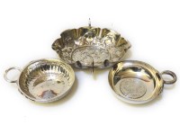 Lot 157 - A Continental silver scalloped form twin handled dish