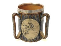 Lot 251 - A Doulton Lambeth silver mounted tyg