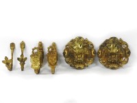 Lot 211 - A pair of cast Ormolu tie backs