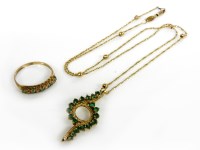 Lot 64A - A gold 's' link and bead necklace marked 375 with an emerald pendant