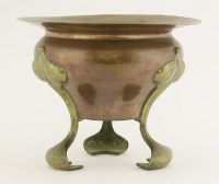 Lot 24 - A copper and brass jardinière