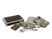 Lot 1225 - A silver and faux crocodile skin wallet