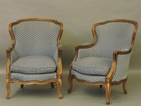 Lot 1668A - A pair of Louis XV design walnut bergere armchairs