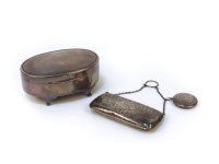 Lot 1270 - A hallmarked silver jewellery casket of oval outline with milled decoration and scroll feet