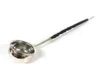 Lot 1265 - A George III silver and whale bone ladle