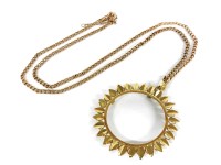 Lot 1166 - A sunflower coin pendant mount