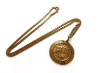 Lot 1130 - A 1958 Sovereign claw set to a gold ribbed mount