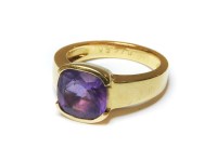 Lot 1176 - A French gold single stone cushion cut amethyst ring