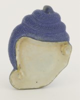 Lot 49 - An unusual porcelain brush lick