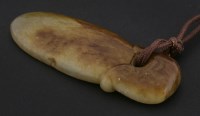 Lot 103 - A jade pendant