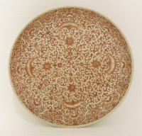 Lot 101 - A Chinese iron-red charger