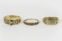 Lot 47 - A seven stone garnet half eternity ring