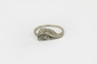 Lot 42 - An 18ct white gold scrolling leaf and diamond ring
3.58g