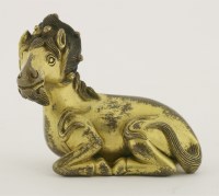 Lot 121 - A gilt bronze mythical beast