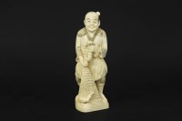 Lot 143 - An early 20th Century Japanese ivory okimono of a fisherman