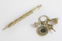 Lot 39 - A chased gold split ring with a gold case chalcedony intaglio seal