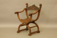 Lot 466 - A 17th century style walnut X framed armchair